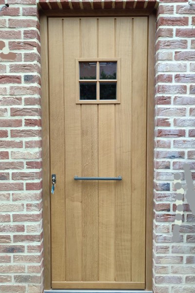 Nouvelle porte en Chêne dans une maison passive dans le brabant wallon